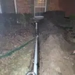 Residential sewer main line re-piped by Serrano's Plumbing Services