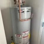 gas water heater installed by serranos plumbing services.